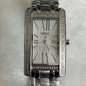 Vintage Jojino stainless steel and diamond watch